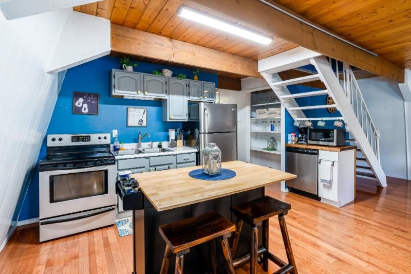 interior of a cabin with a modern kitchen