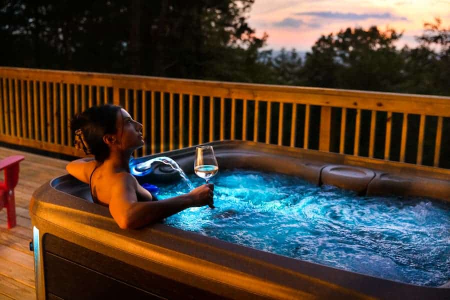 a woman in a hot tub