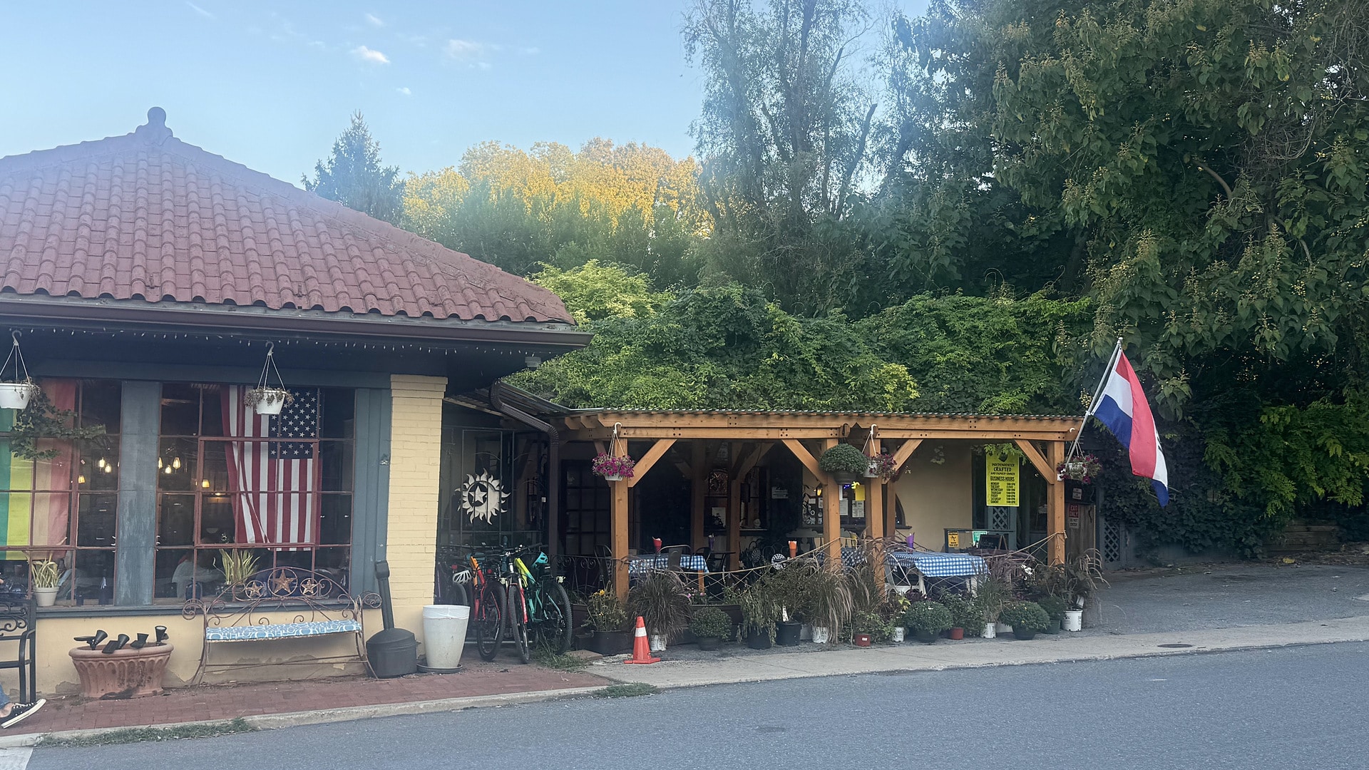 The entrance and covered patio of Blue Moon Cafe on East High Street in Shepherdstown