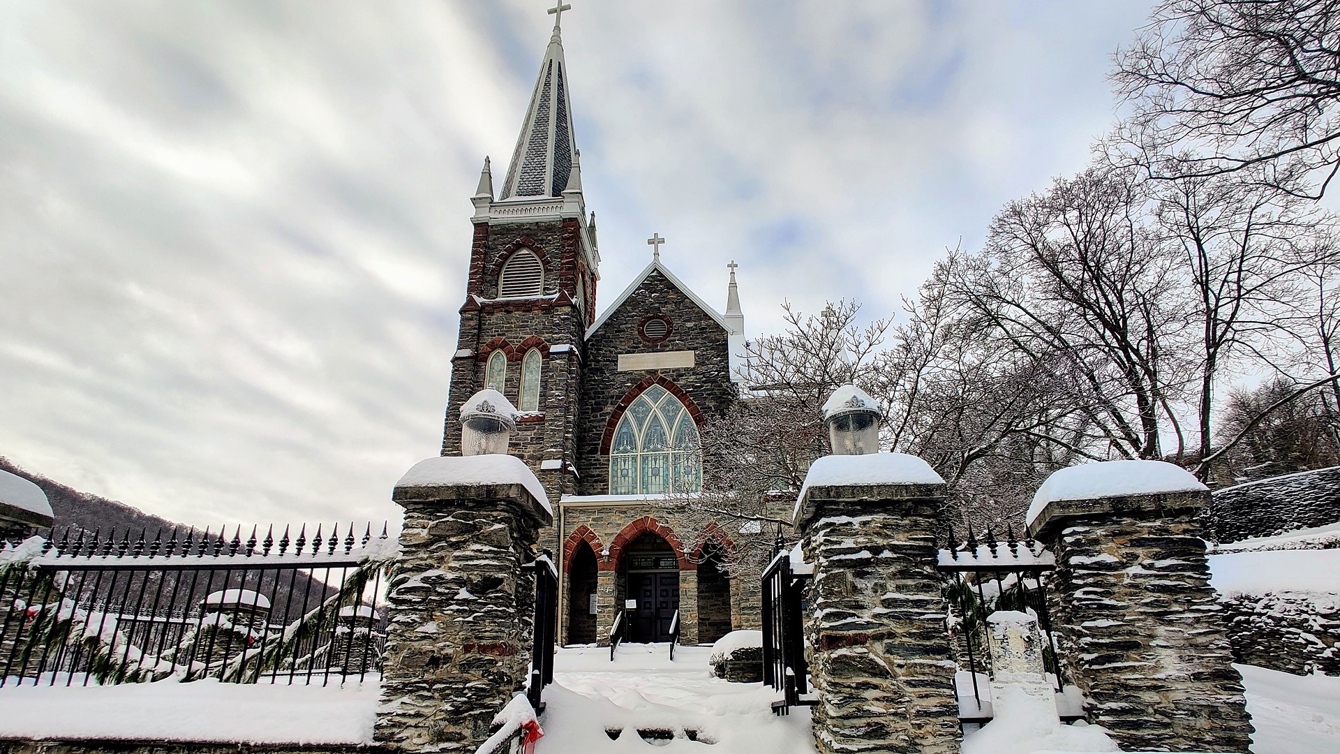 St. Peter's Catholic Church above Lower Town Harpers Ferry covered in snow
